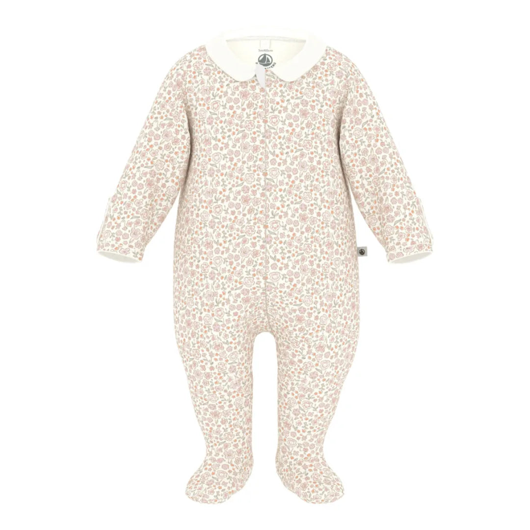 A breathtaking Petit Bateau baby footie featuring an immaculate multi-color floral print, an elegant collar, and a convenient front zip closure.