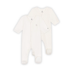 A flat-lay view of the Petit Bateau 2-pack velour baby pajamas in gentle neutral tones.