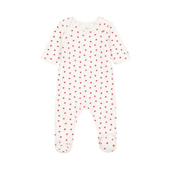 A front view of the soft white Petit Bateau velour footie with red heart prints and side snaps.
