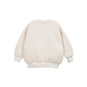 The clean back view highlighting the comfortable infant fleece silhouette.