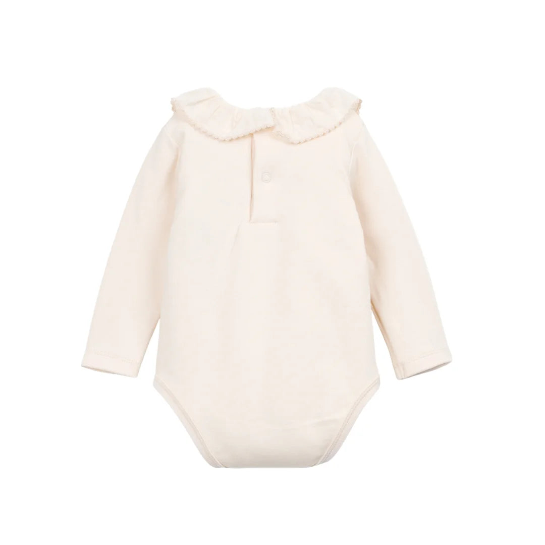 The clean back view highlighting the comfortable infant bodysuit silhouette.