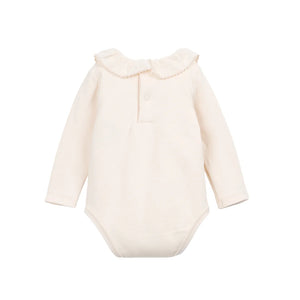 The clean back view highlighting the comfortable infant bodysuit silhouette.
