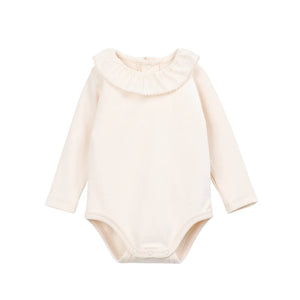 A front view of the Play Up rib body in beige.