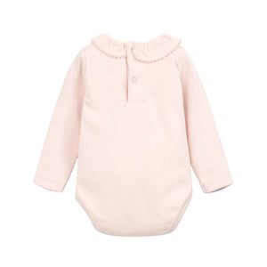 The clean back view highlighting the comfortable infant bodysuit silhouette.