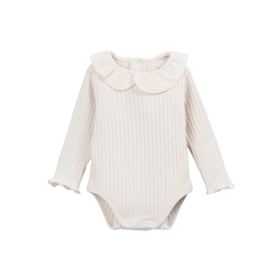 A front view of the Play Up ribbed body in beige.