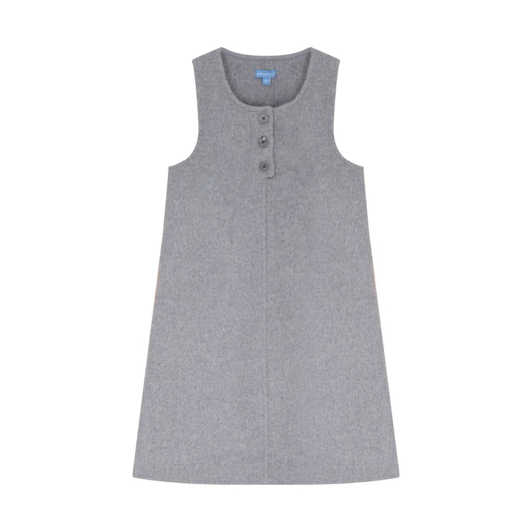 A high-resolution close-up highlighting the intricate placket buttons and fine wool knit texture.