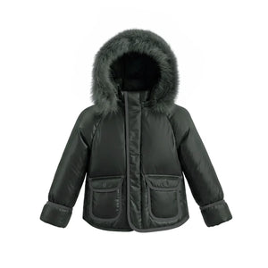 A front view of the Pramie green corduroy jacket for little boys.