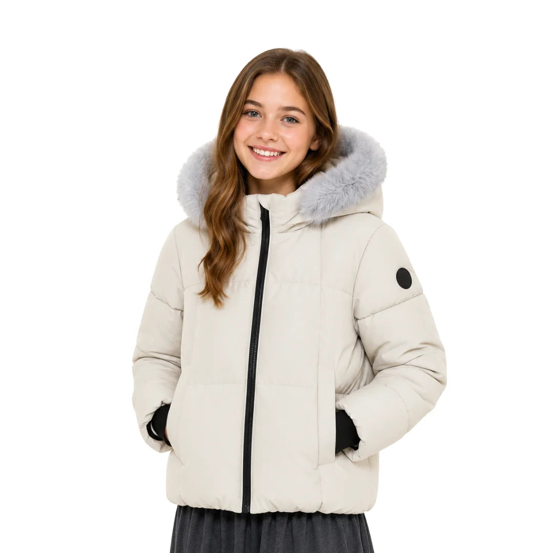 A youth styled in the Pramie beige fluted neck bomber during an outdoor autumn outing.