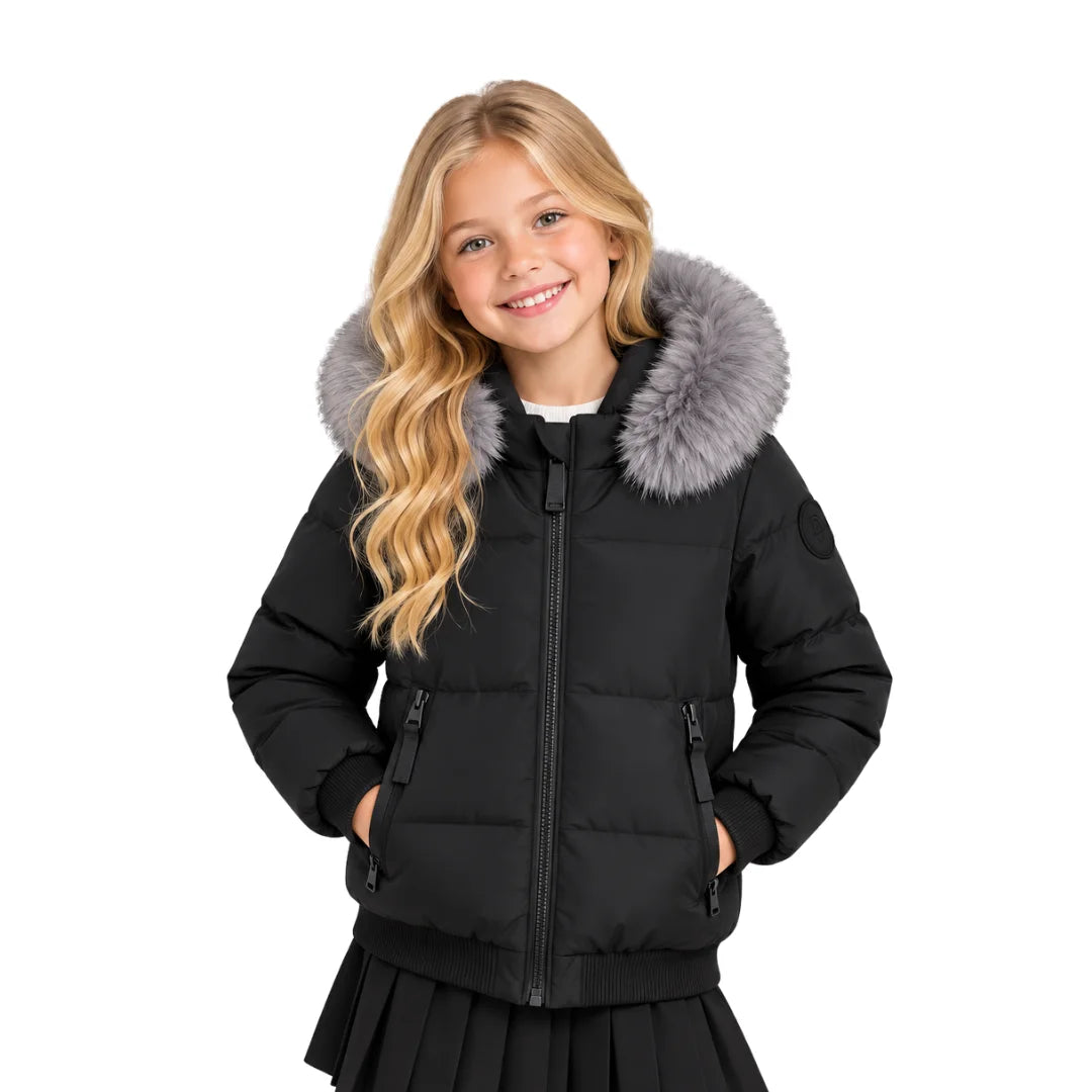 A youth styled in the Pramie silver fox bomber jacket