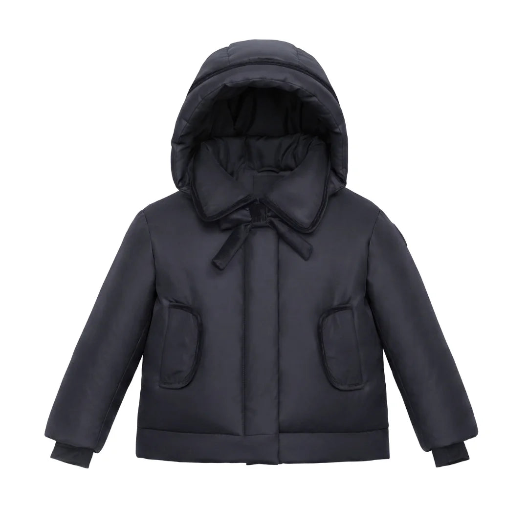 A front view of the Pramie black jacket with a tied bow for girls.
