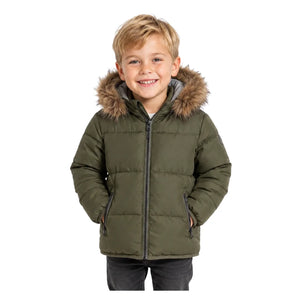 A child styled in the Pramie green contrast coat during an outdoor autumn outing.