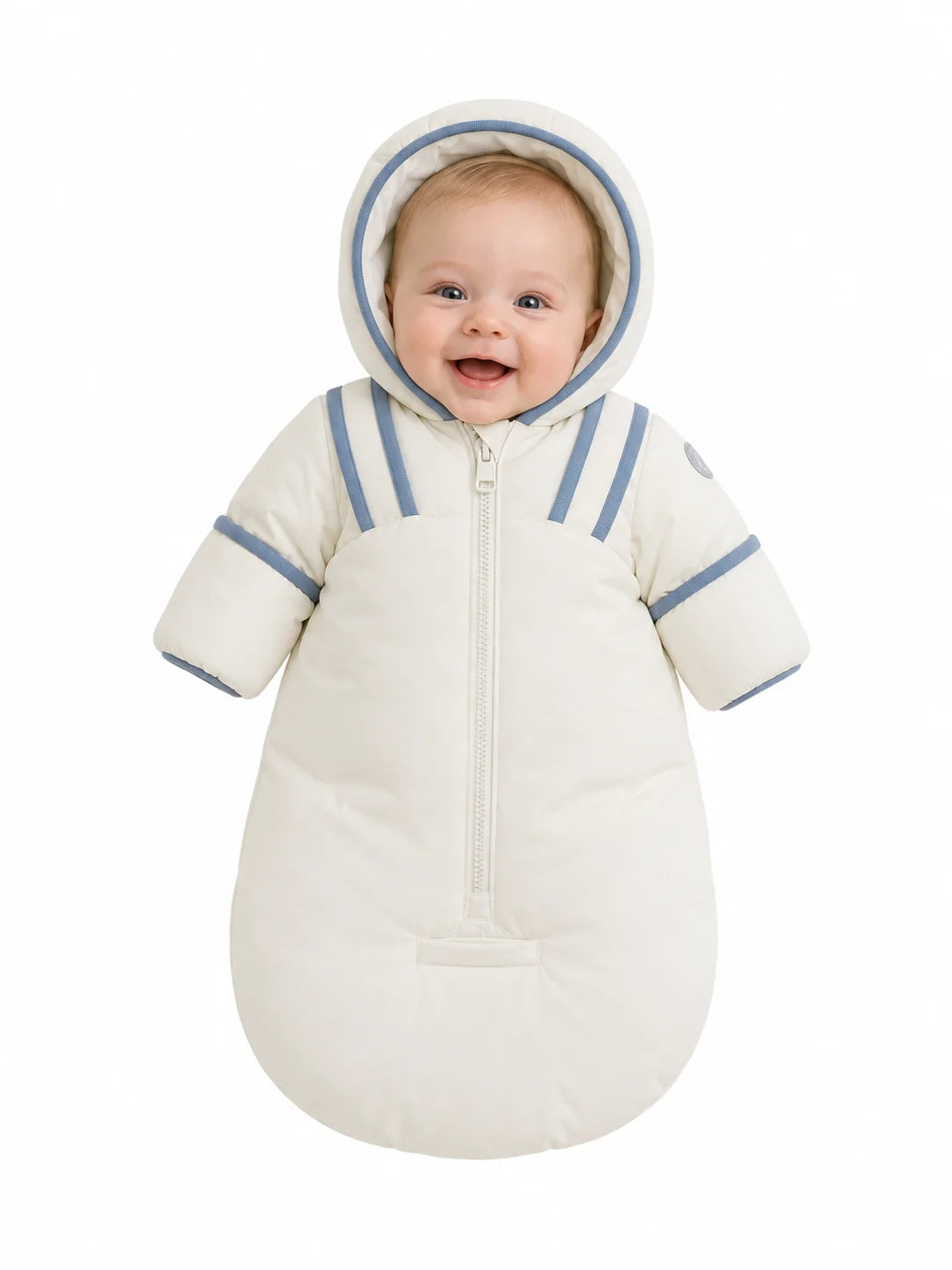 An infant resting comfortably in the Pramie blue snow suit during a winter walk.