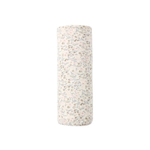 A neatly folded stack of the Quincy Mae botanical print bamboo swaddle.