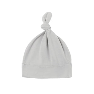 A front view of the Quincy Mae cloud organic cotton knotted newborn baby hat.