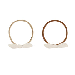 A front view of the Quincy Mae natural organic cotton little knot headbands.
