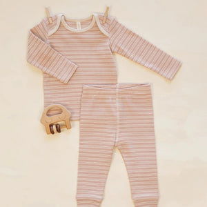 A high-resolution close-up of the stretchy ribbed texture and delicate dusty rose stripe pattern.