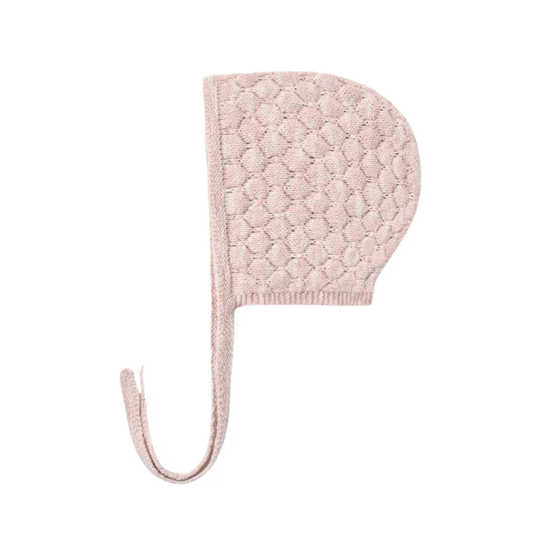 A front view of the Quincy Mae dusty rose speckle knit bonnet with chin ties.