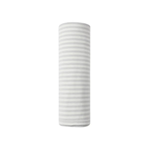 A flat lay view of the Quincy Mae cloud stripe organic cotton baby swaddle blanket.