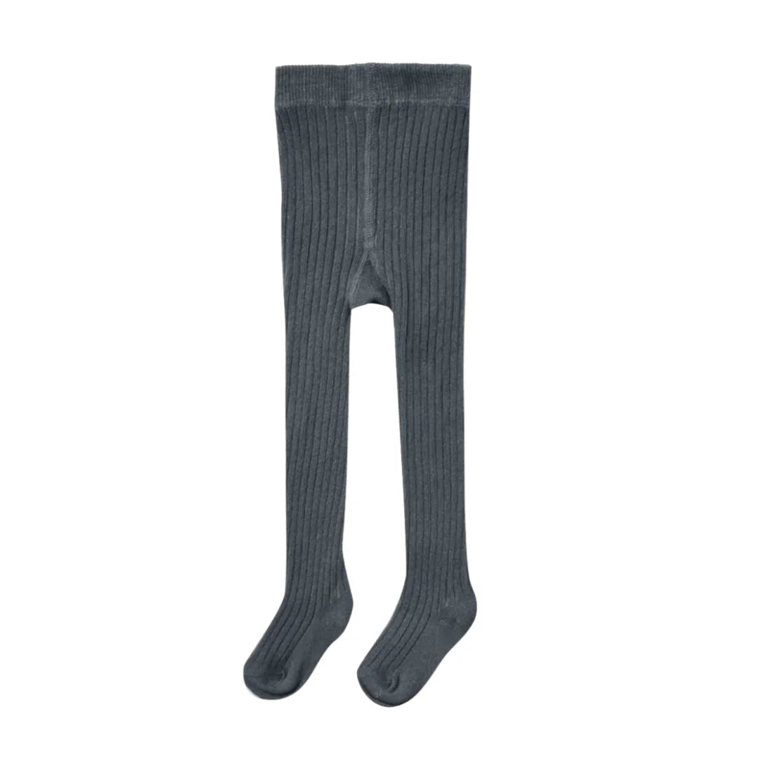 A front view of the soft indigo-colored knit tights by Quincy Mae.