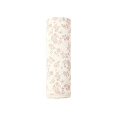 A flat lay view of the Quincy Mae vine floral organic cotton baby swaddle blanket.