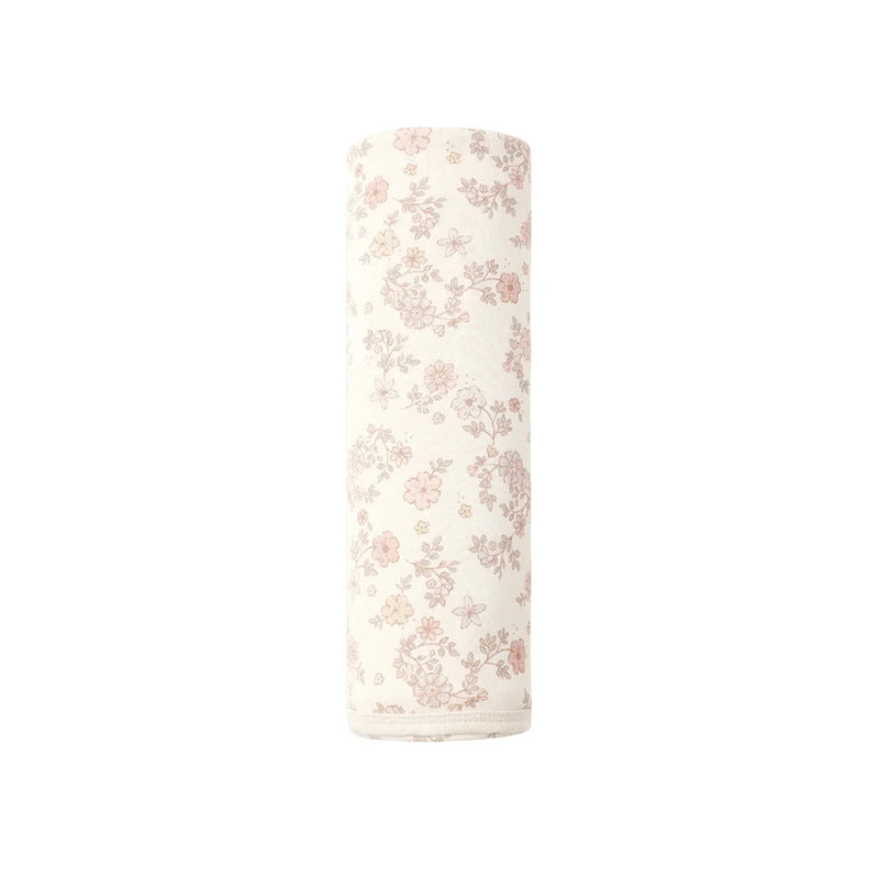 A flat lay view of the Quincy Mae vine floral organic cotton baby swaddle blanket.