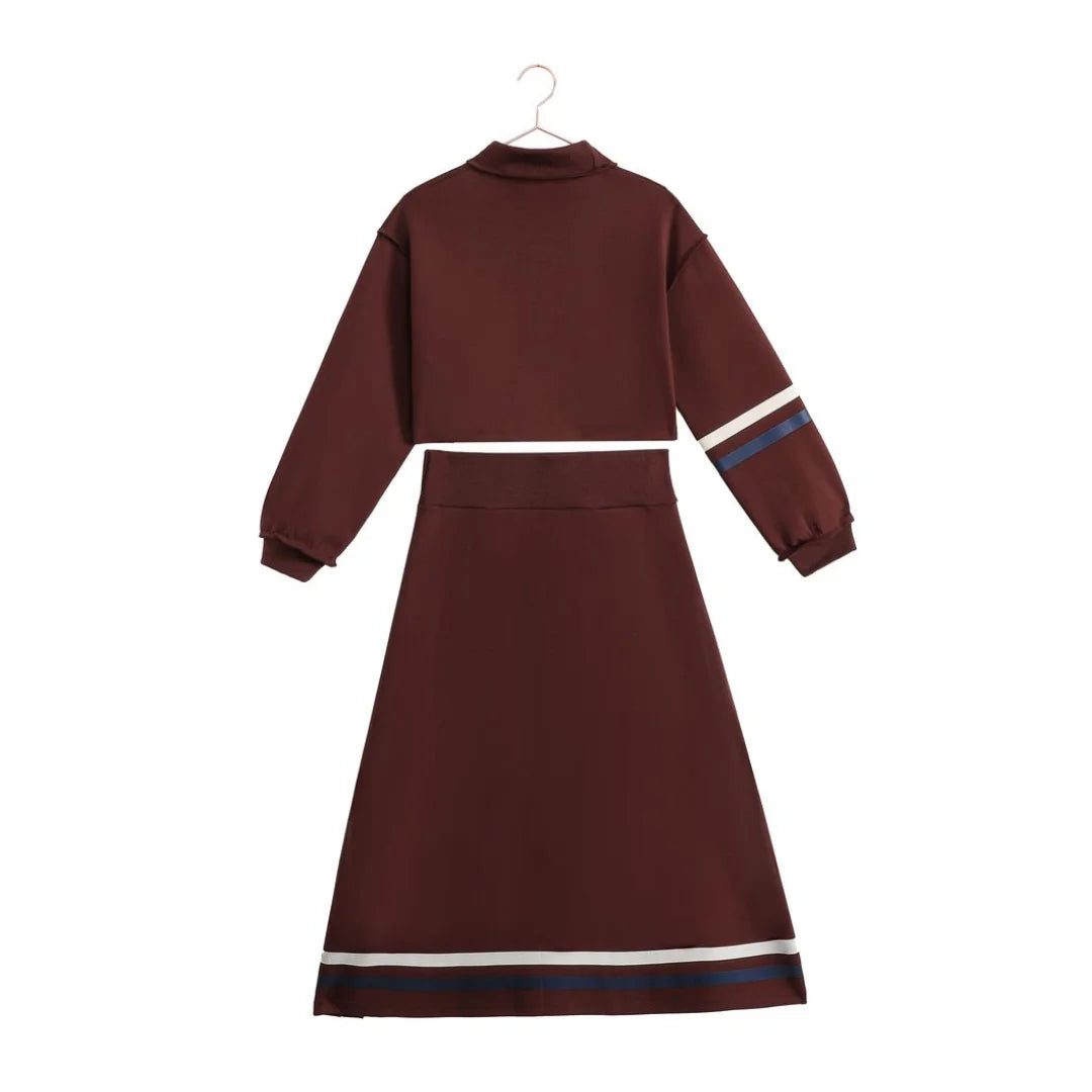 A beautifully structured RetroKid Arden two-piece teen set featuring a top and skirt in a vibrant cranberry red scuba fabric back