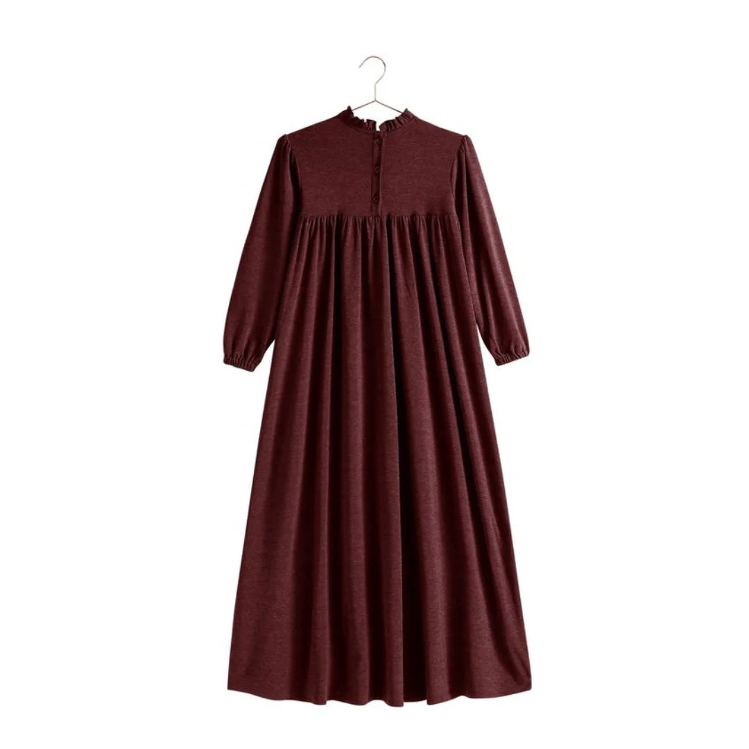 The back view of the burgundy knit RetroKid Isla maxi dress, showcasing its sweeping silhouette.