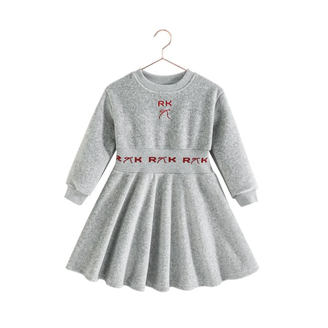 RetroKid Reese dress made of smooth gray scuba fabric with bright red accents.