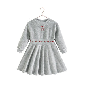 RetroKid Reese dress made of smooth gray scuba fabric with bright red accents.