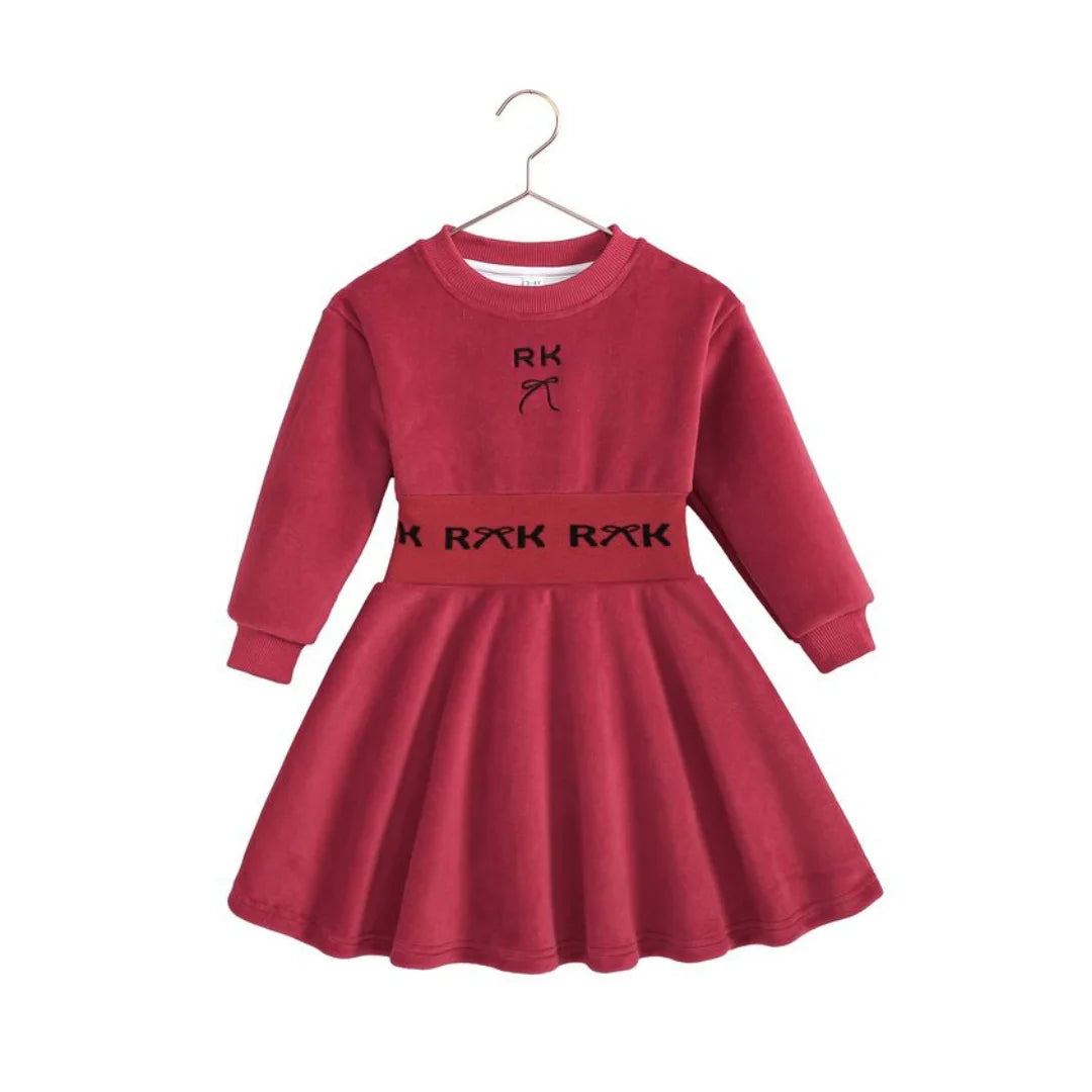 The back view of the modern red scuba dress by RetroKid, featuring clean, minimalist lines.