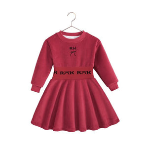 The back view of the modern red scuba dress by RetroKid, featuring clean, minimalist lines.