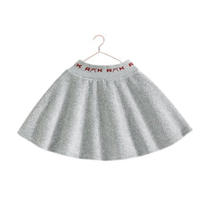 The back view of the gray and red RetroKid girls scuba skirt, showing its smooth, flared shape.
