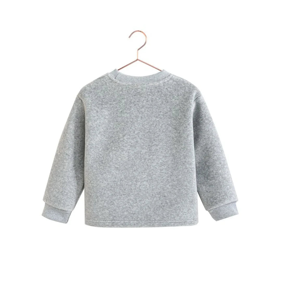 The back view of the gray and red RetroKid Reese scuba top, showing the clean lines of the design.