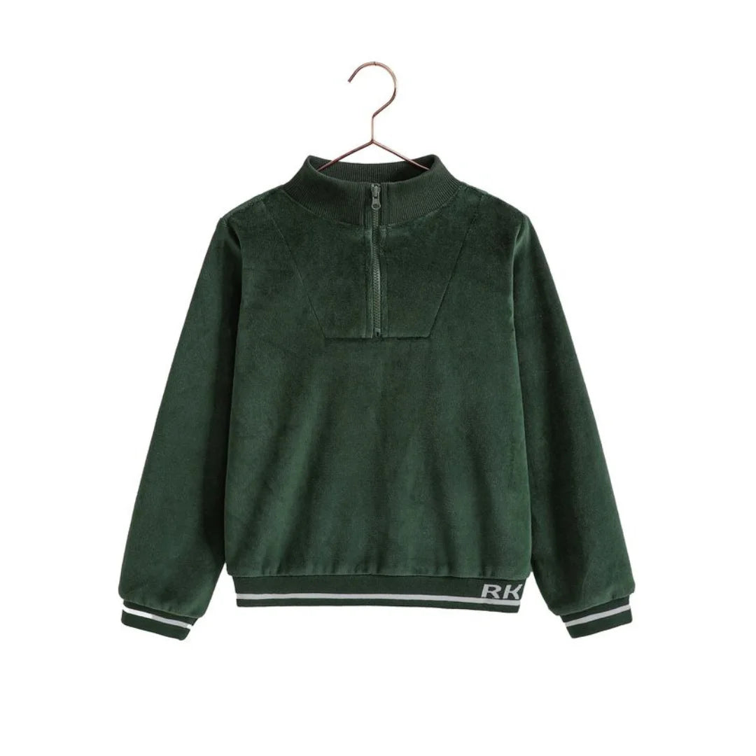 A profile view of the RetroKid green velour zip-up, highlighting the comfortable fit and front zipper.