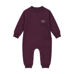A front view of the Rooie and Friends mauve baby girl romper and mockneck set.