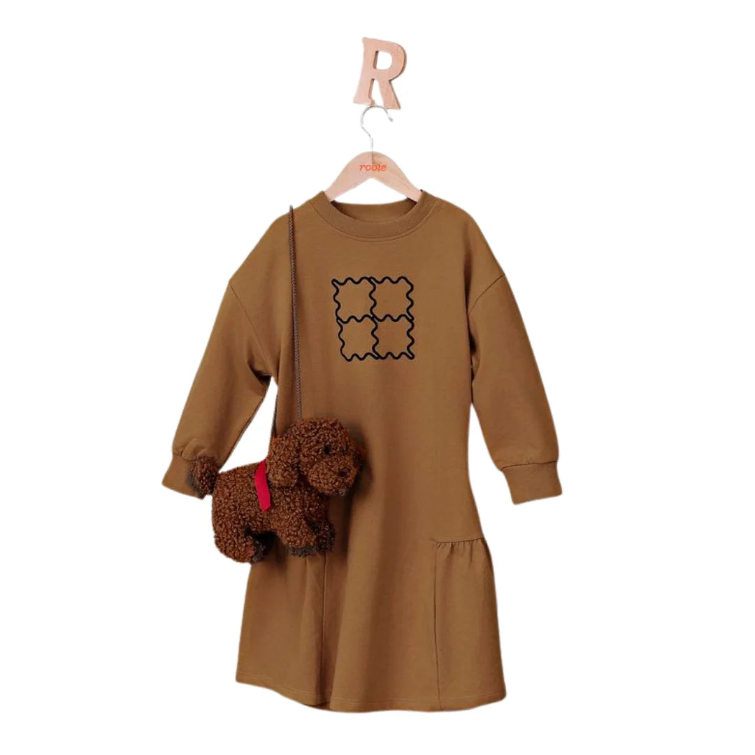 A front view of the Rooie and Friends caramel and black ruffle dress for girls.