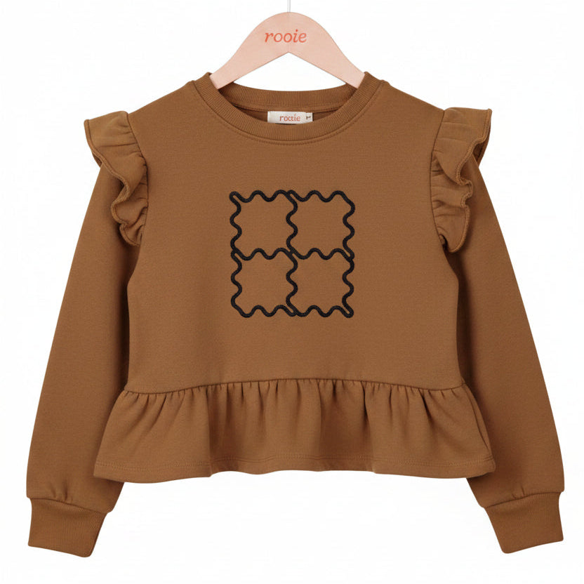 A front view of the Rooie and Friends caramel and black ruffle sweatshirt for girls.