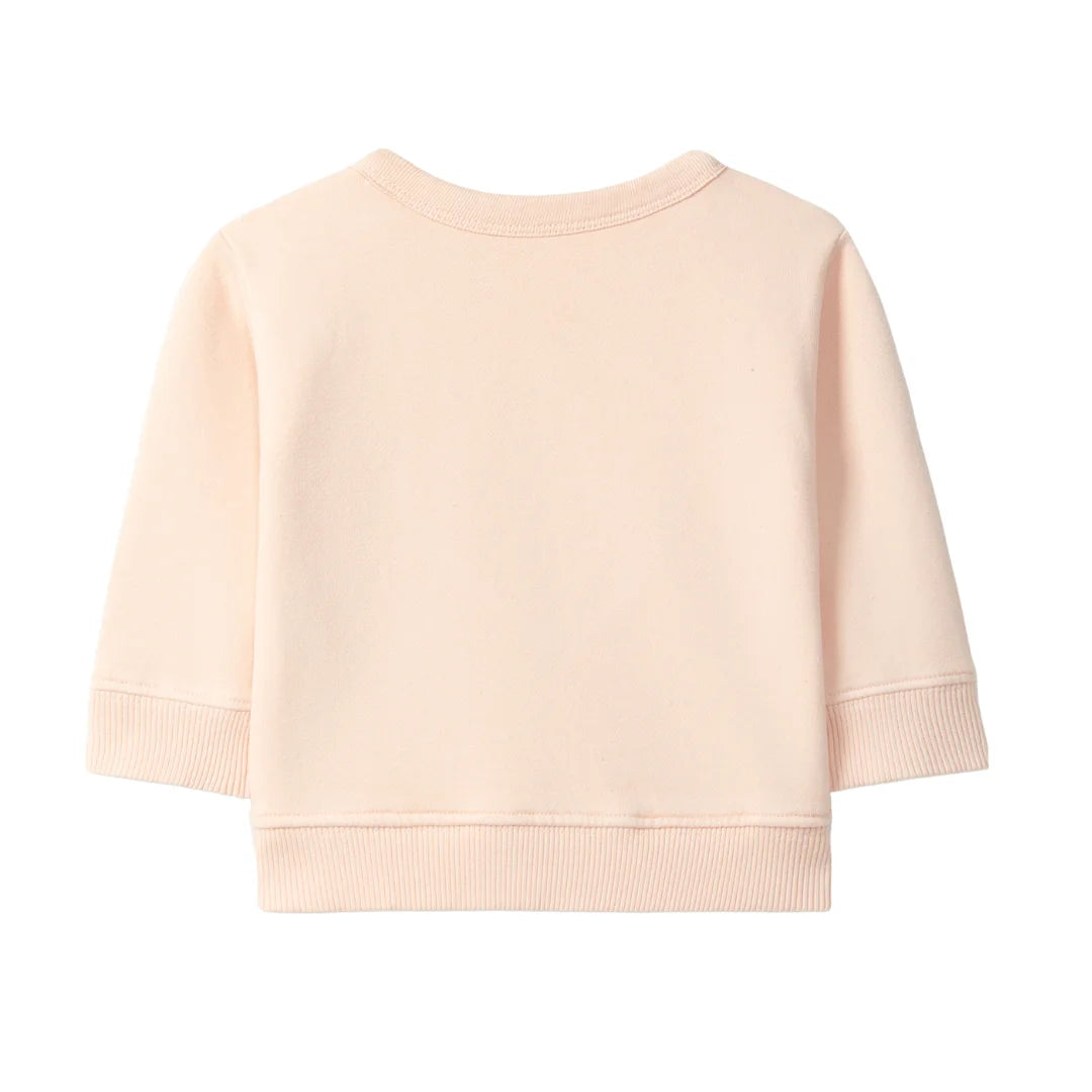 The clean back view of the comfortable pullover.
