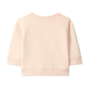 The clean back view of the comfortable pullover.