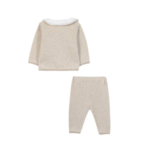 The clean back view of the luxury baby layette set.