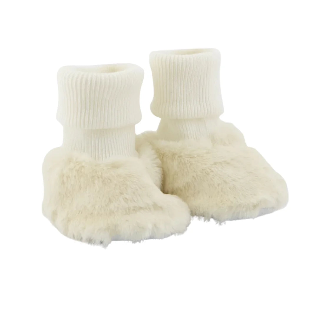 A front view of the Tartine et Chocolat cotton and imitation fur shoes in ecru.