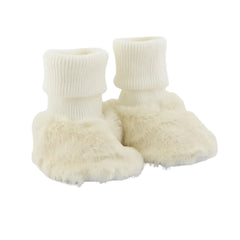 A front view of the Tartine et Chocolat cotton and imitation fur shoes in ecru.