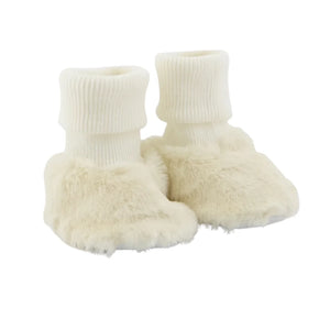 A front view of the Tartine et Chocolat cotton and imitation fur shoes in ecru.