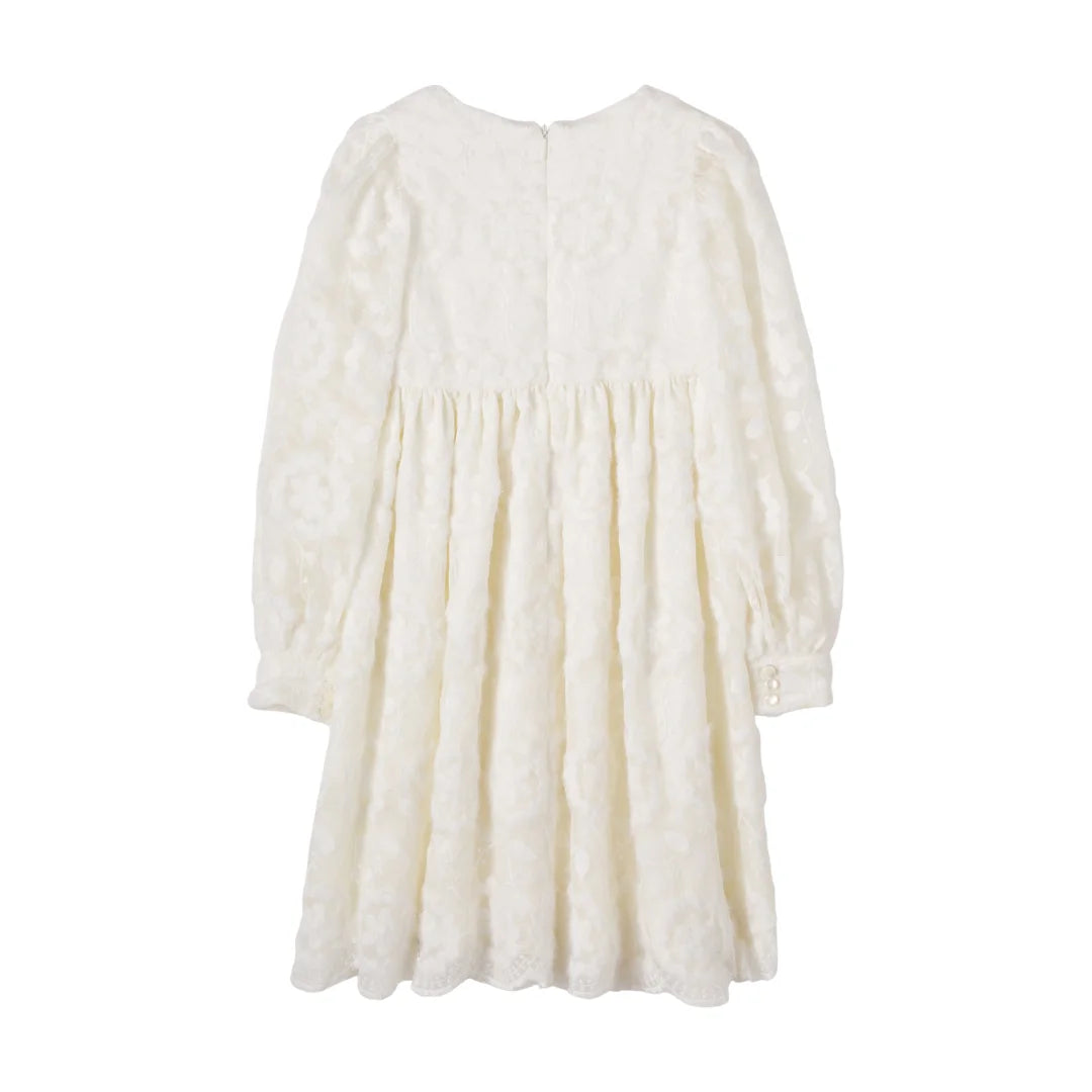 The clean back view highlighting the tailored dress silhouette.