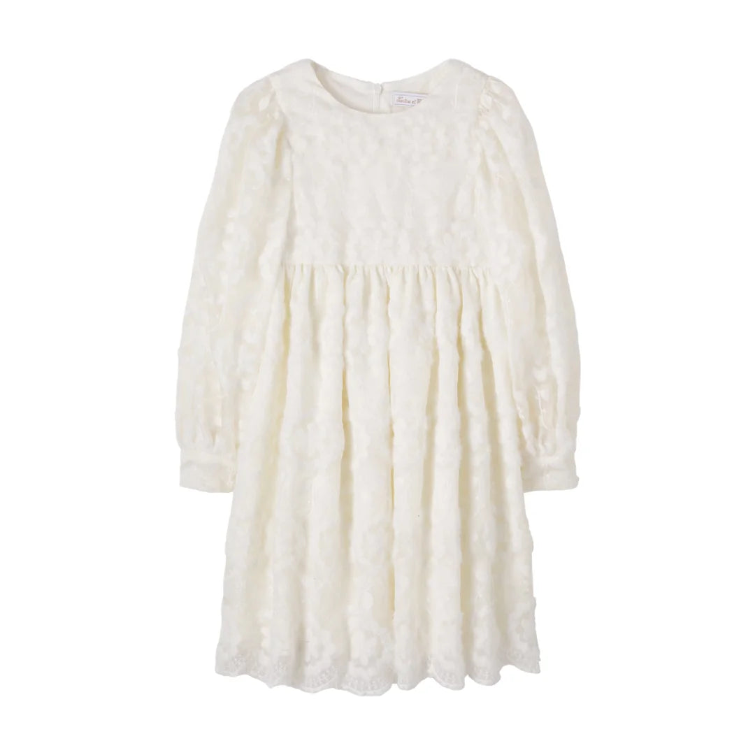 A front view of the Tartine et Chocolat floral dress.