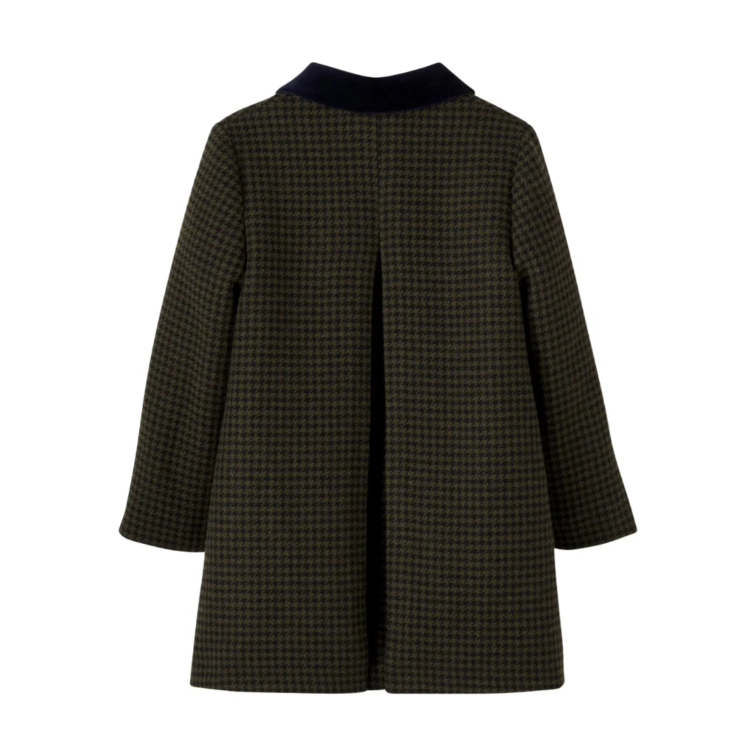 The clean back view highlighting the tailored winter coat silhouette.