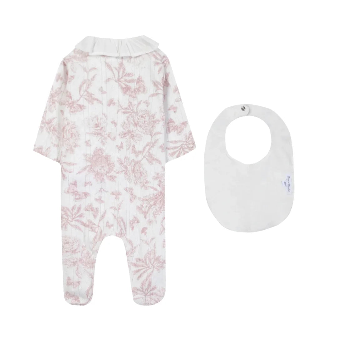 The clean back view of the luxury newborn designer cotton jumpsuit.