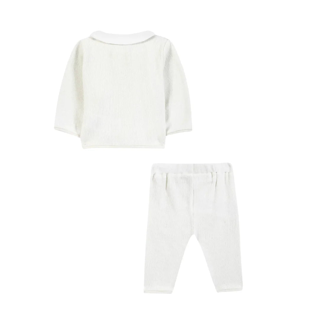 The clean back view of the luxury baby layette set.