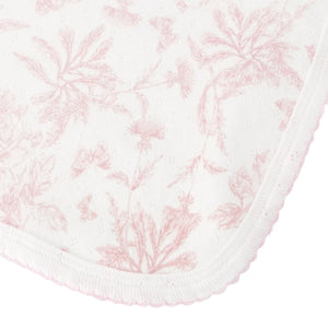 A high-resolution close-up of the delicate pink plaid weave and refined trim.