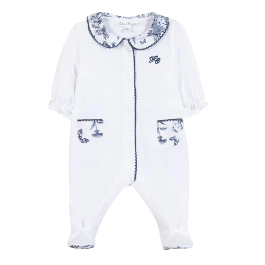 A sophisticated pair of Dark Blue printed Tartine et Chocolat pajamas, showcasing the refined architectural collar and high-end French print.
